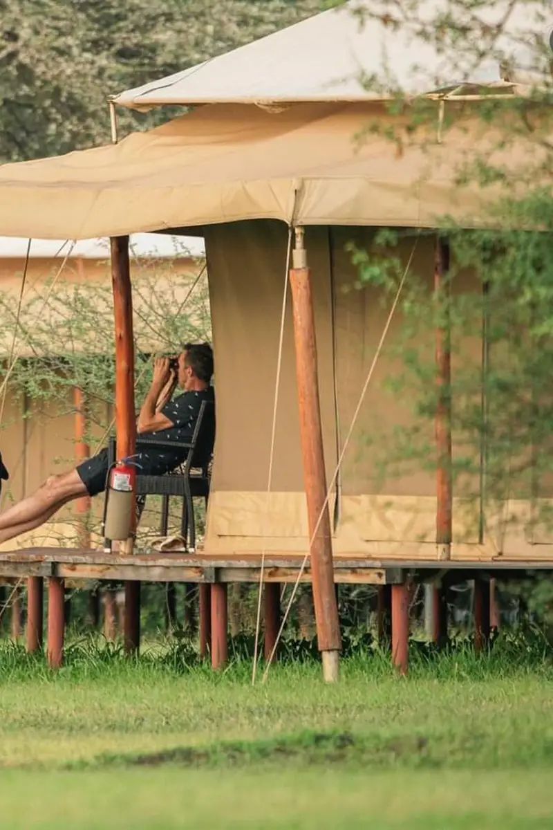 Holiday Adventure Africa camping man in the hut