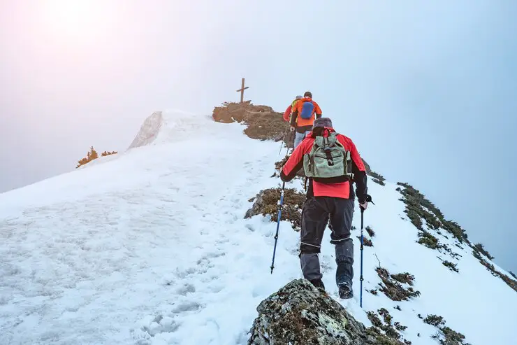 line-hikers-are-climbing-towards-top-mountain-covered-thick-fog